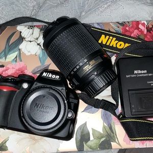Nikon D3100 with Nikon DX 55-200mm VR plus strap and battery/charger